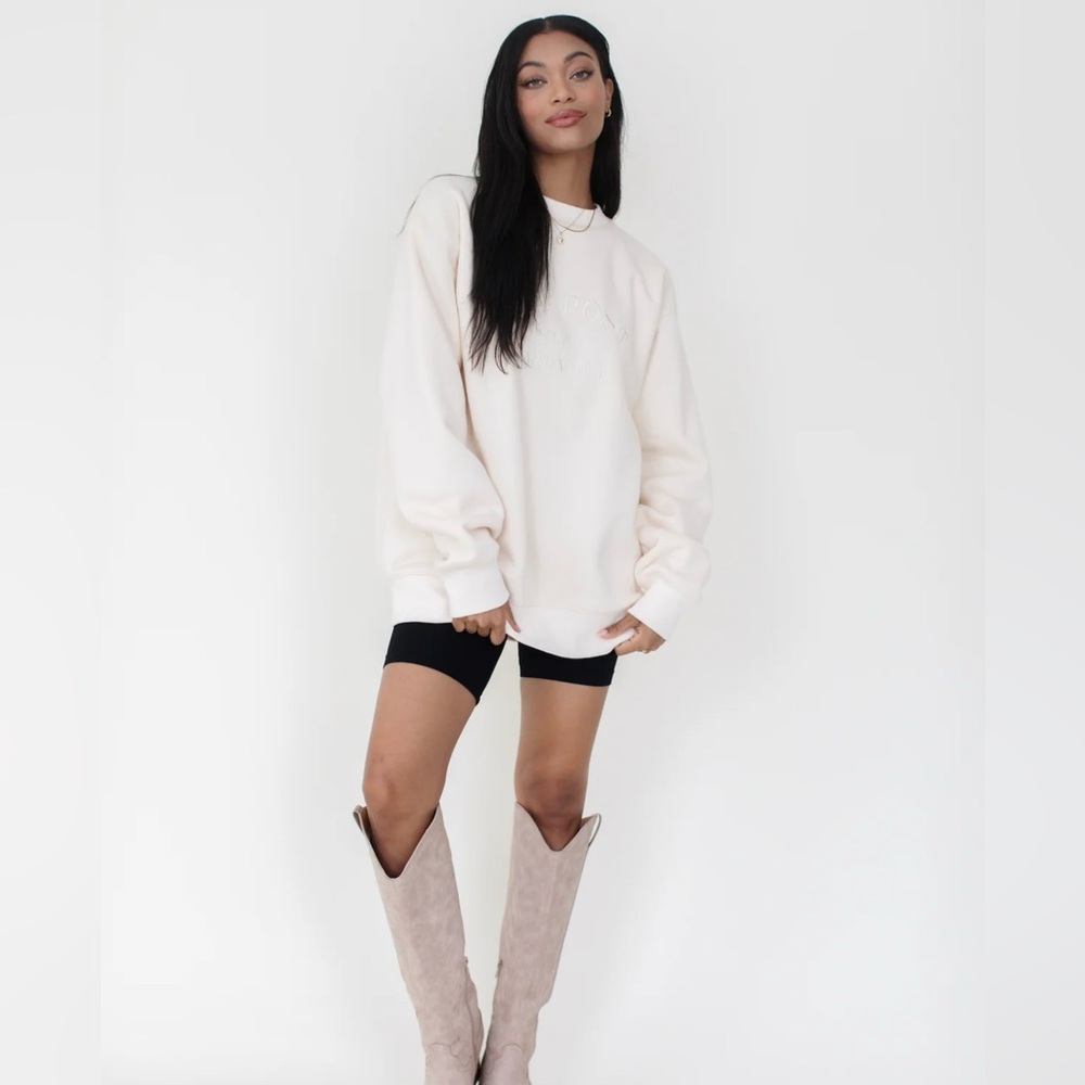 The Post “Postie” sweatshirt on cream